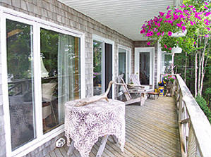 Relax on the deck, overlooking the lake